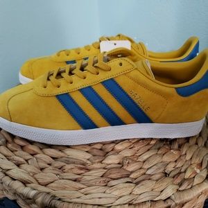 blue yellow adidas gazelle